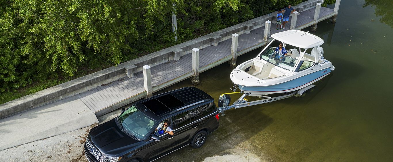 towing boat out of boat ramp for transportation