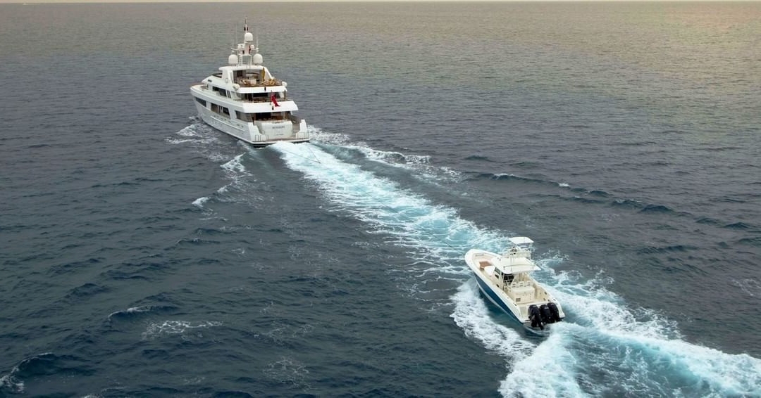 Large Vessel in tow of 42 foot tender